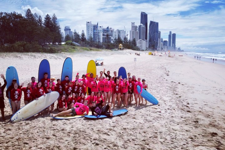 a group of people on a beach
