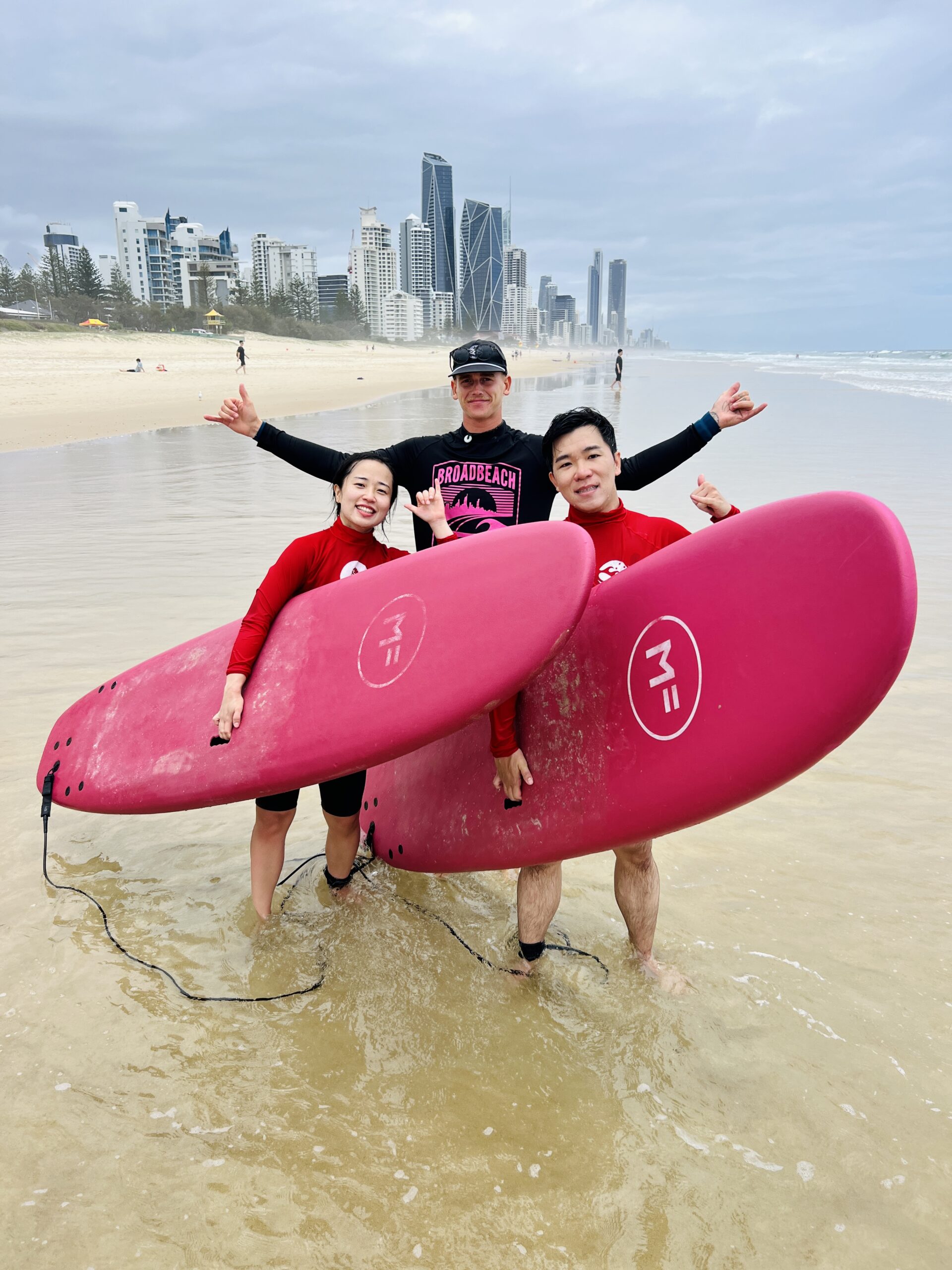 a person standing next to a body of water