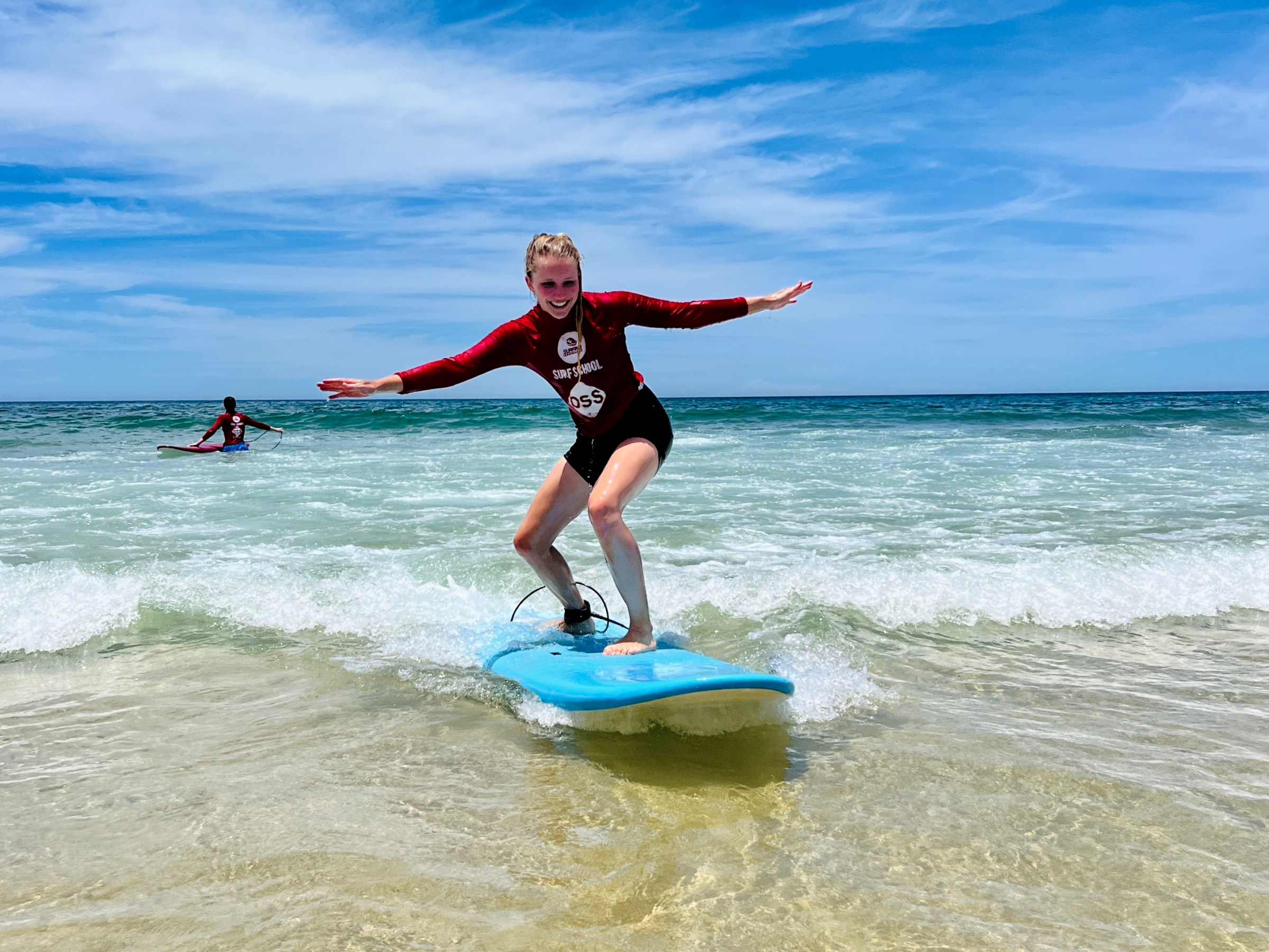 a man riding a surfboard in the ocean